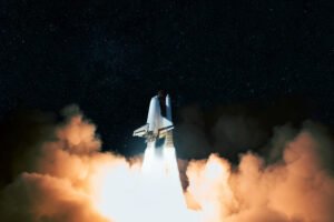 Rocket with clouds of smoke takes off upward into space. Spacesh